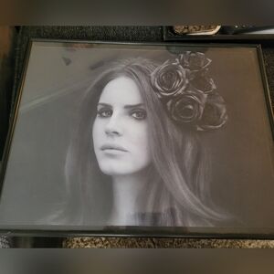 Black framed Lana del Rey picture
